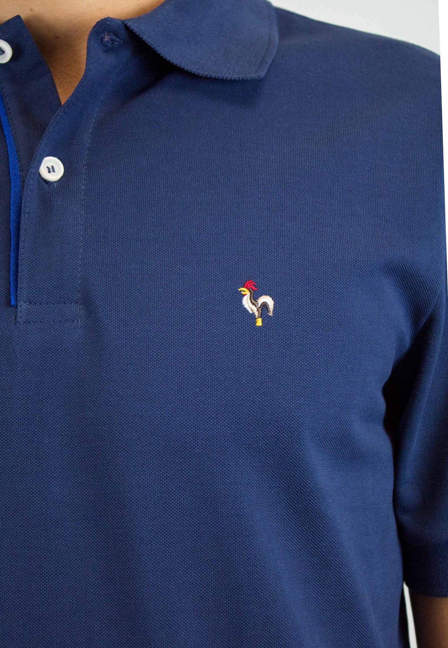 Polo petróleo de manga corta