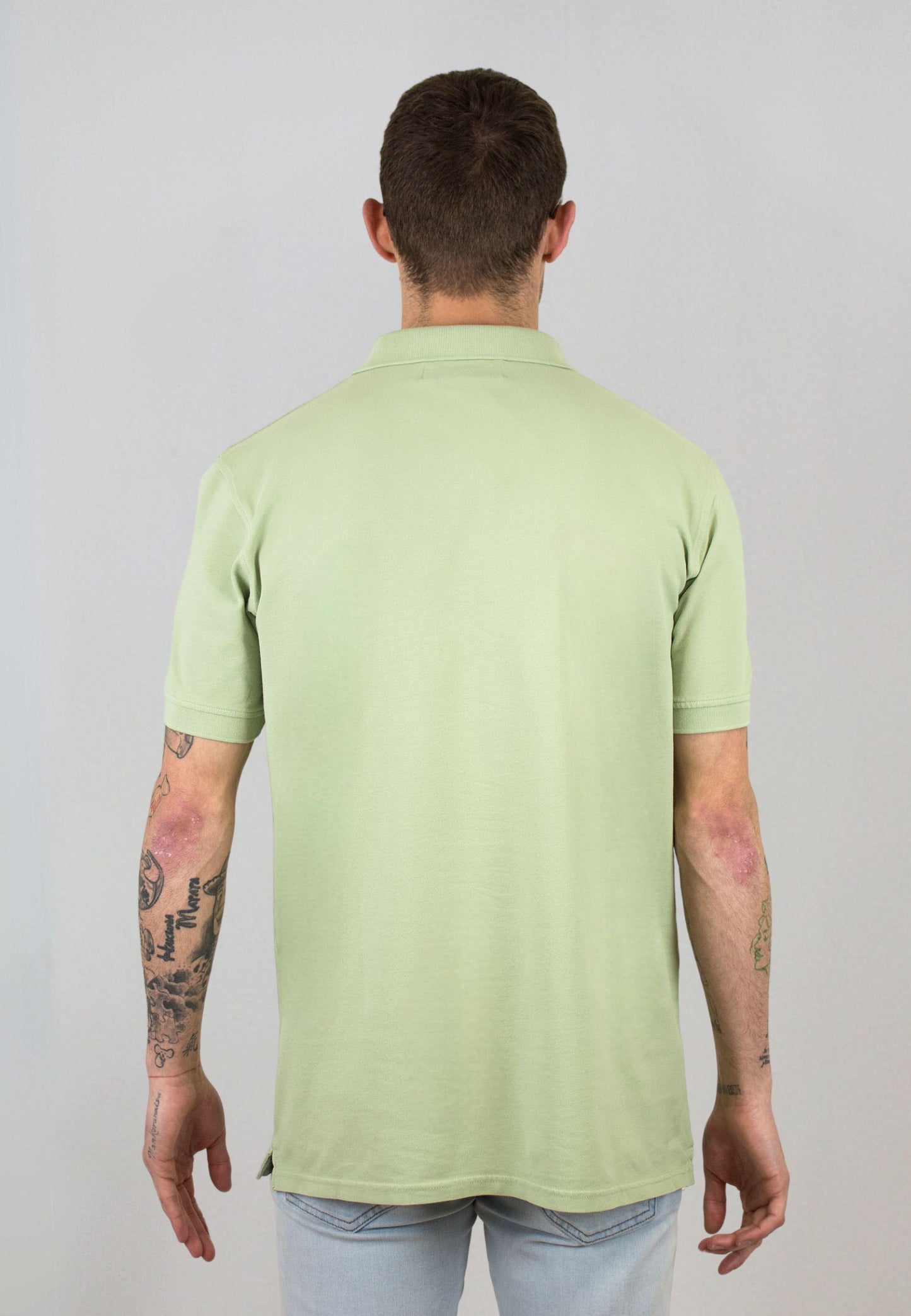 Polo al tono verde de manga corta