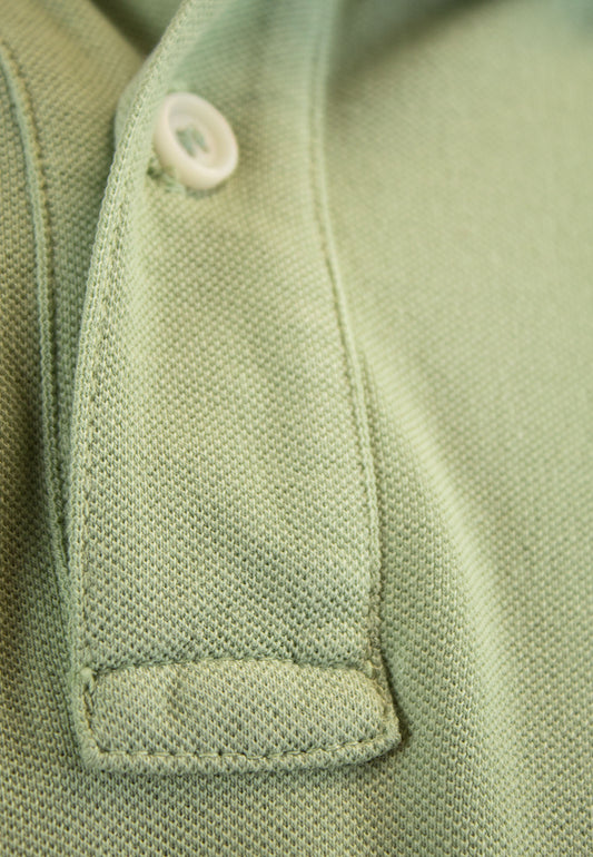 Polo al tono verde de manga corta