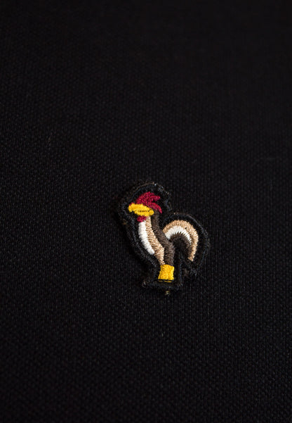 Polo negro de manga corta