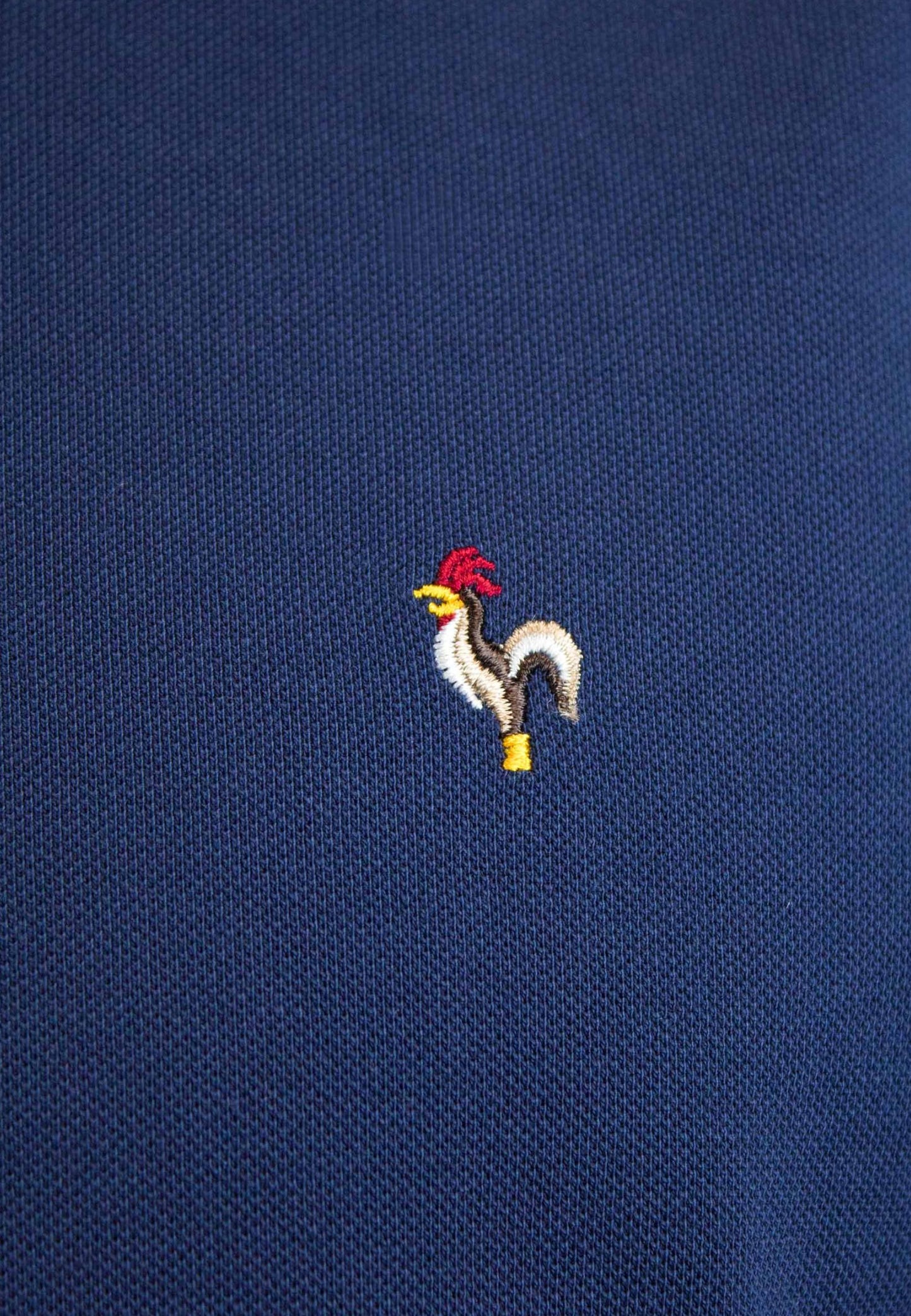 Polo petróleo de manga corta