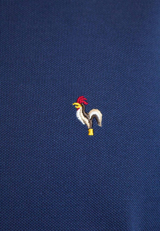 Polo petróleo de manga corta
