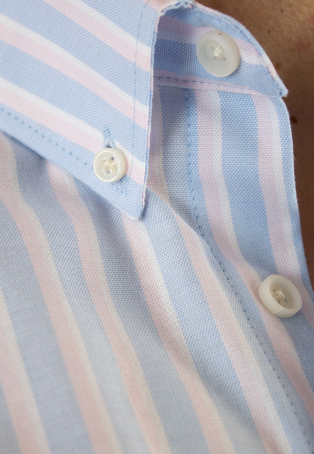 Camisa de rayas azul celeste y rosa