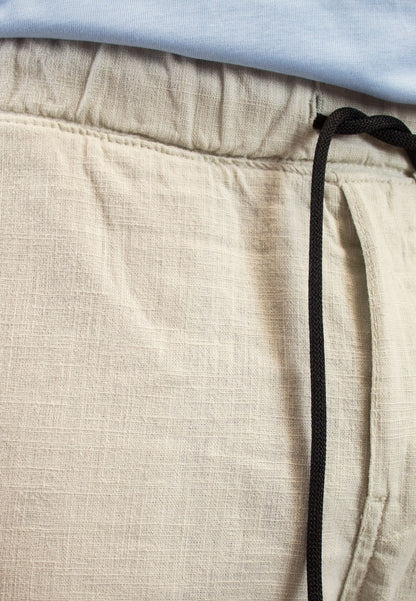 Pantalón chino de lino con gomas crudo