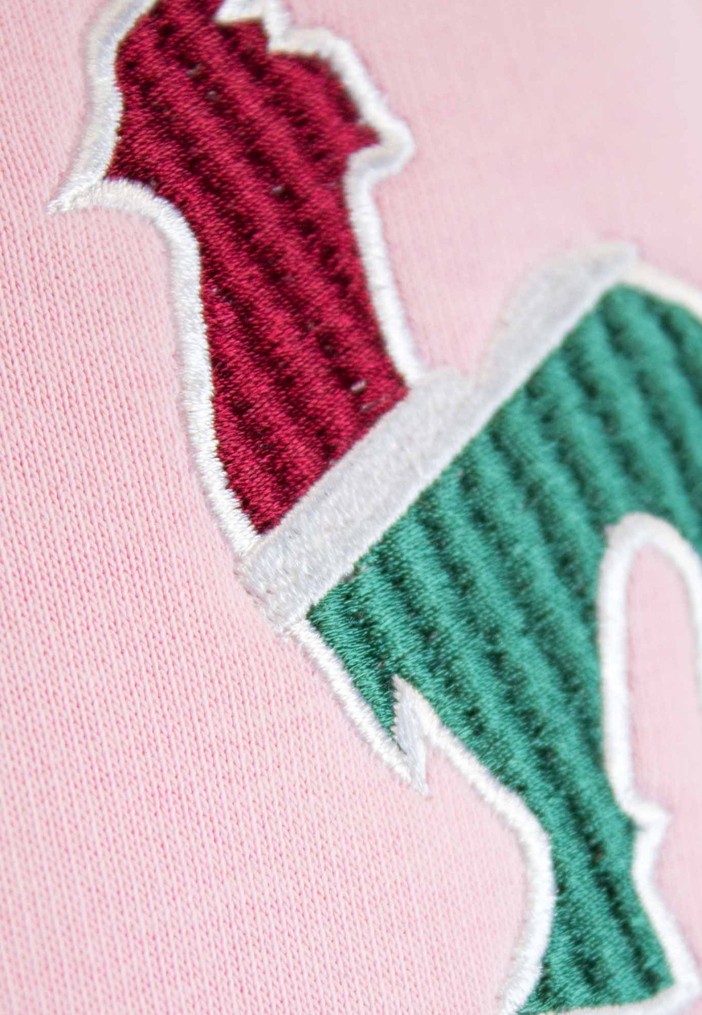 Sudadera rosa con bordado mediano