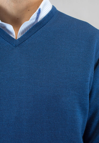 Jersey de pico azul con lana