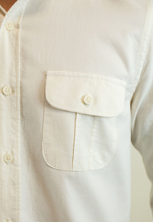 Camisa con bolsillos beige